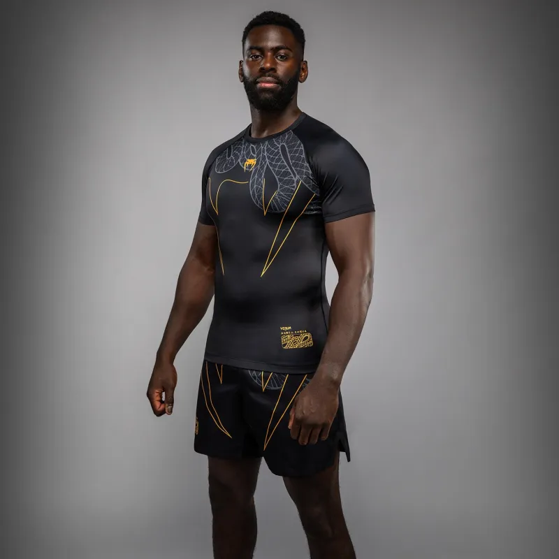 Venum Serpenti Short Sleeve Rashguard - Black/Silver/Gold - Image 2